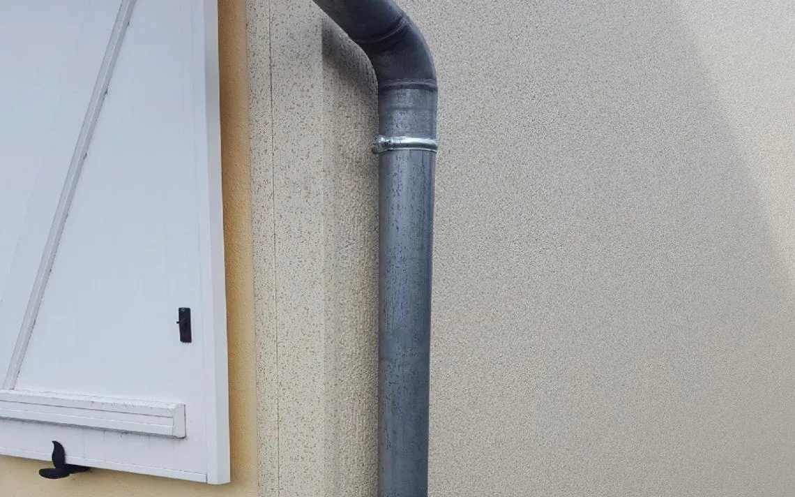 Isolation thermique et embellissement d'un pignon d'une maison des années 80
