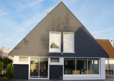 Isolation thermique et embellissement d'une grande maison avec jardin